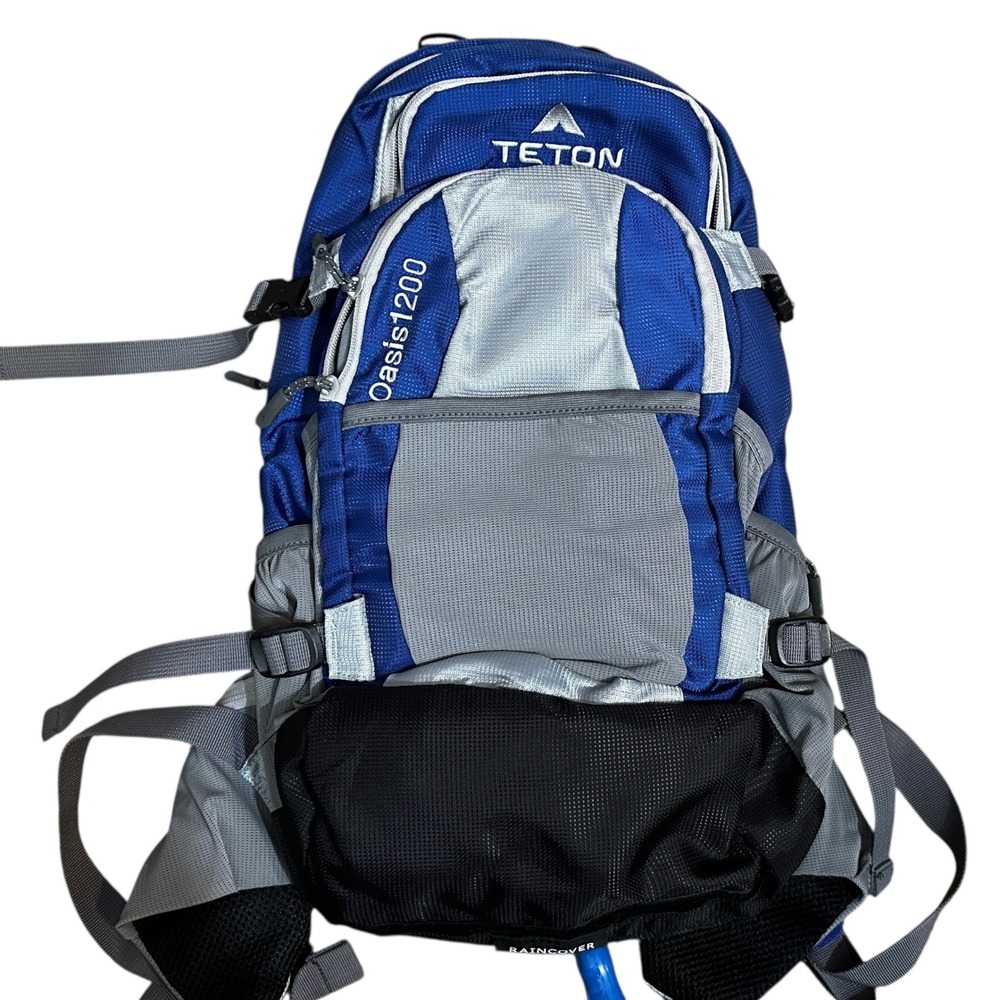 Teton Sports Oasis 1200 Hydration Backpack Blue Gray Pack with‎ Water Bladder